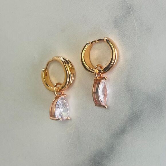 REVOLVE Luv AJ X Dezi Gold Huggies with Mismatched Prong-set Crystal Drops - Picture 4 of 5